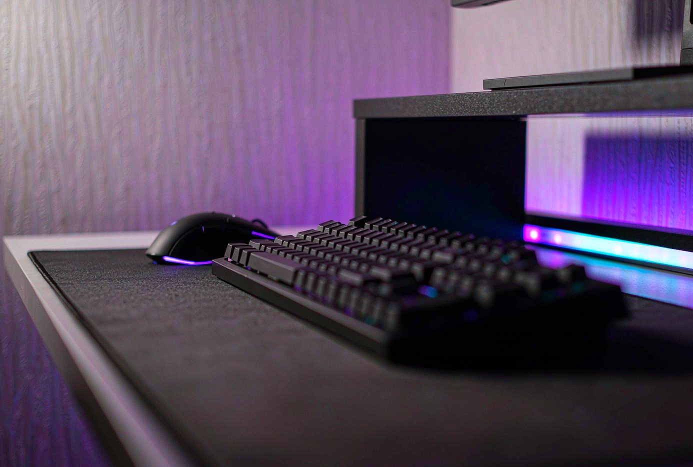Gaming desk setup with RGB lighting from KiKi Arcade